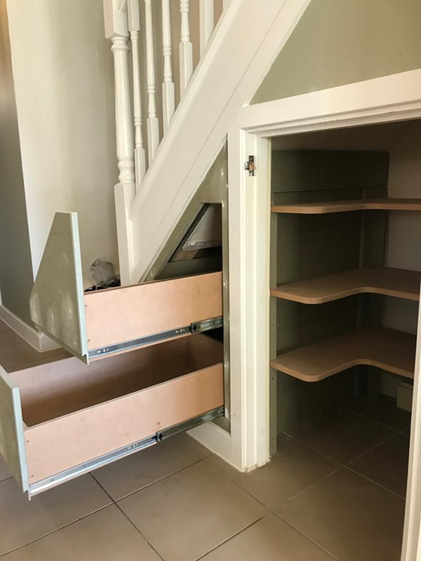 hidden under stair storage